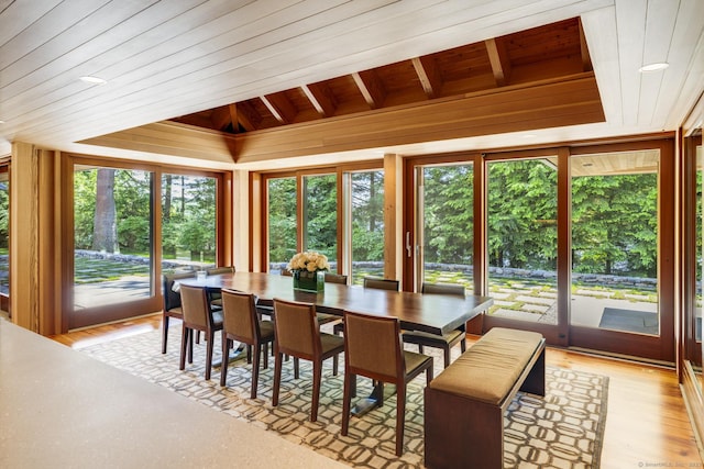 sunroom featuring wooden ceiling