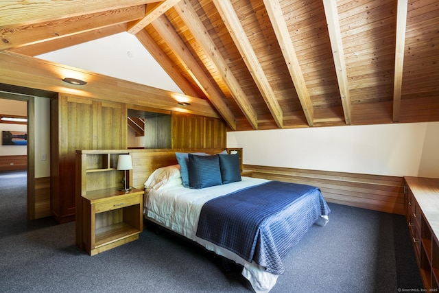 bedroom featuring dark carpet, lofted ceiling with beams, wood ceiling, and wood walls