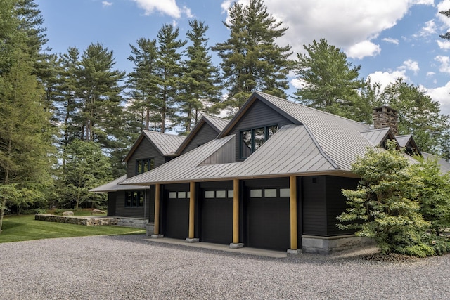 garage featuring aphalt driveway