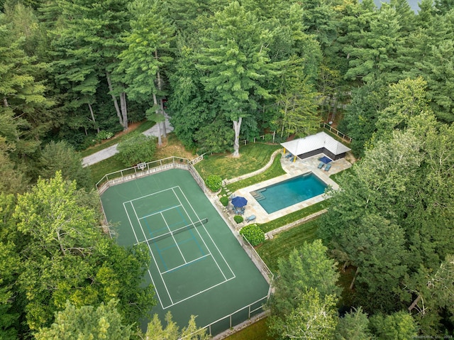 aerial view with a wooded view