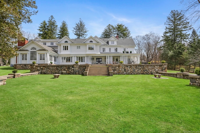 47 Peaceable St, Ridgefield, CT 06877 - rear view of property featuring a yard and a chimney
