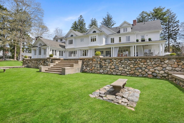 47 Peaceable St, Ridgefield, CT 06877 - rear view of property with a chimney and a yard
