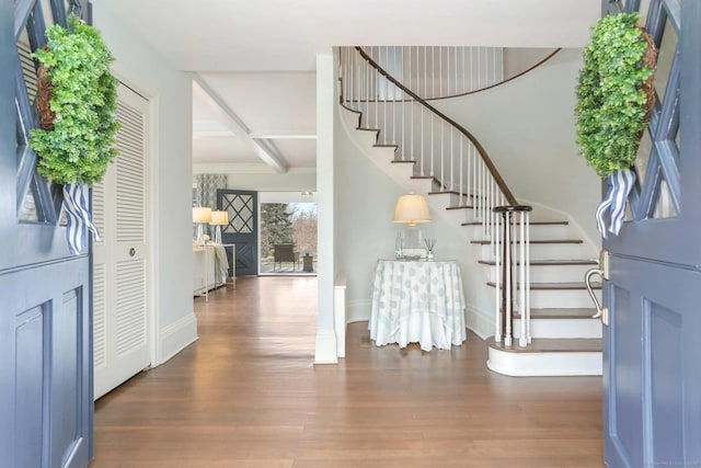 47 Peaceable St, Ridgefield, CT 06877 - entrance foyer with stairway, wood finished floors, baseboards, coffered ceiling, and beam ceiling