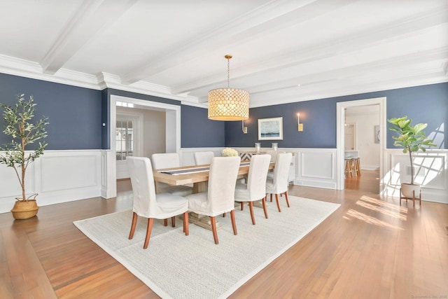 47 Peaceable St, Ridgefield, CT 06877 - dining room with beamed ceiling, a wainscoted wall, wood finished floors, a decorative wall, and ornamental molding