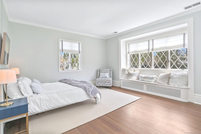 47 Peaceable St, Ridgefield, CT 06877 - bedroom featuring ornamental molding, multiple windows, wood finished floors, and baseboards