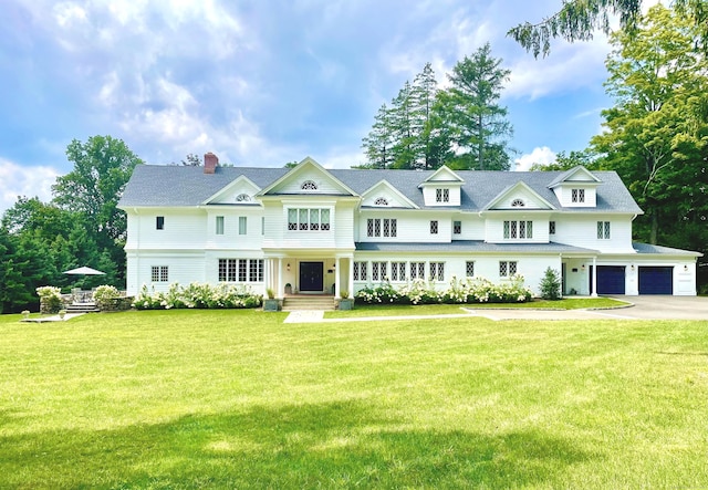 47 Peaceable St, Ridgefield, CT 06877 - shingle-style home featuring driveway, a front lawn, a chimney, and a garage
