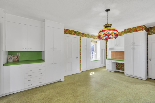 interior space featuring wallpapered walls