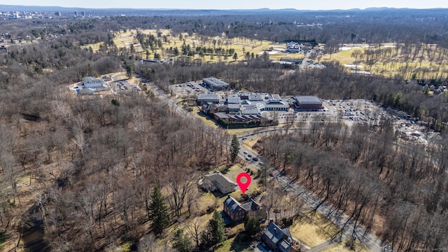 bird's eye view featuring a forest view