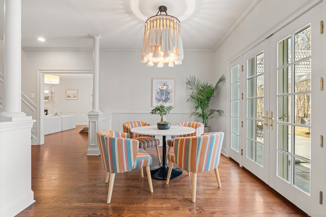 275 Newtown Tpke, Weston, CT 06883 - dining area with wood finished floors, crown molding, french doors, and decorative columns