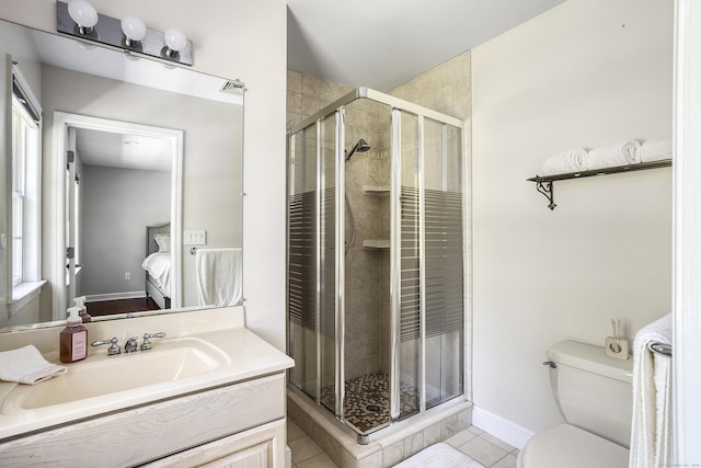 21 Centennial Dr, Danbury, CT 06811 - bathroom featuring a shower stall, vanity, tile patterned floors, toilet, and ensuite bathroom