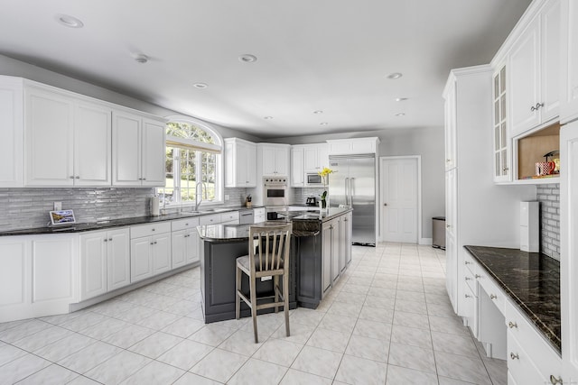 21 Centennial Dr, Danbury, CT 06811 - kitchen featuring backsplash, stainless steel appliances, and a sink