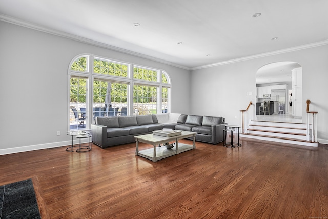 21 Centennial Dr, Danbury, CT 06811 - living room featuring crown molding, arched walkways, baseboards, and wood finished floors