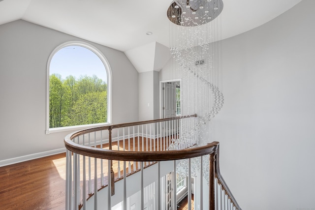 21 Centennial Dr, Danbury, CT 06811 - corridor with baseboards, an upstairs landing, wood finished floors, and lofted ceiling