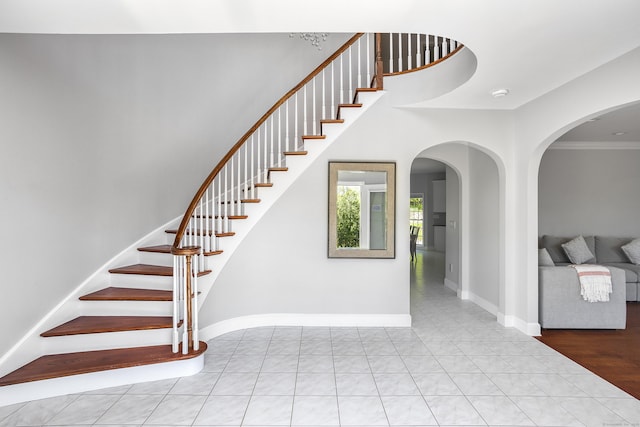 21 Centennial Dr, Danbury, CT 06811 - staircase featuring baseboards, ornamental molding, and tile patterned flooring