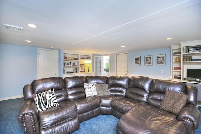 carpeted living room featuring visible vents and recessed lighting
