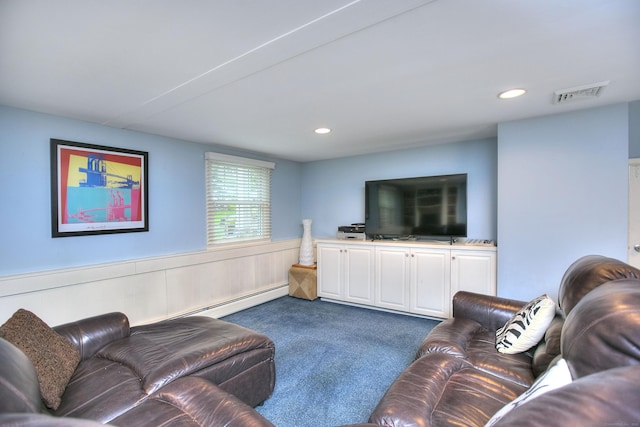 living area with dark carpet, visible vents, wainscoting, a baseboard heating unit, and recessed lighting