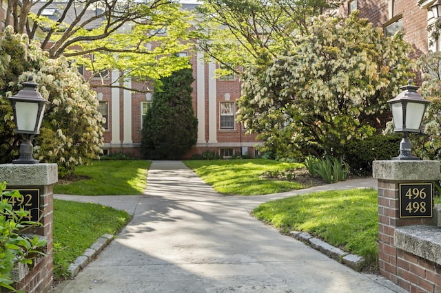 498 Whitney Ave Unit 1D, New Haven, CT 06511 - view of front of house featuring brick siding and a front lawn