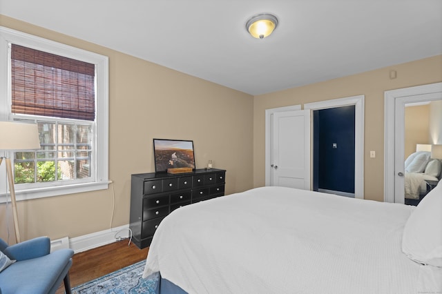 498 Whitney Ave Unit 1D, New Haven, CT 06511 - bedroom with wood finished floors and baseboards