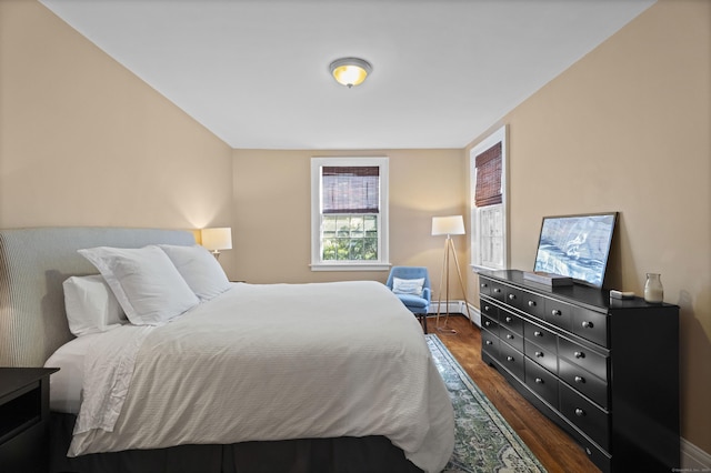 498 Whitney Ave Unit 1D, New Haven, CT 06511 - bedroom with dark wood-style flooring and a baseboard heating unit