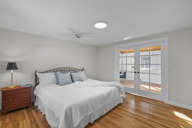 bedroom with access to outside, french doors, a ceiling fan, baseboards, and wood finished floors