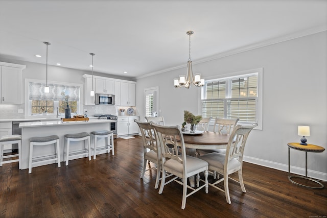 dining room featuring an inviting chandelier, recessed lighting, dark wood-style floors, and ornamental molding