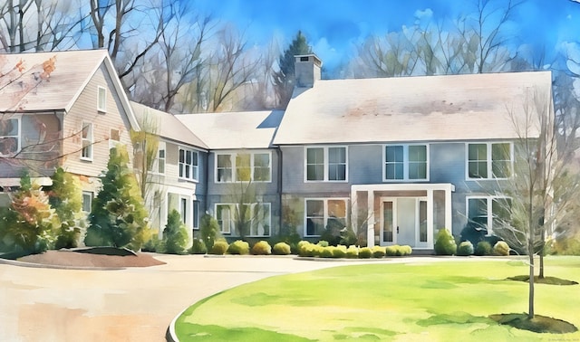exterior space featuring view of golf course and a chimney