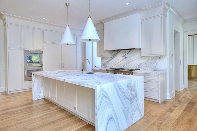 7 Brookside Dr, Westport, CT 06880 - kitchen featuring double oven, a sink, white cabinets, and tasteful backsplash