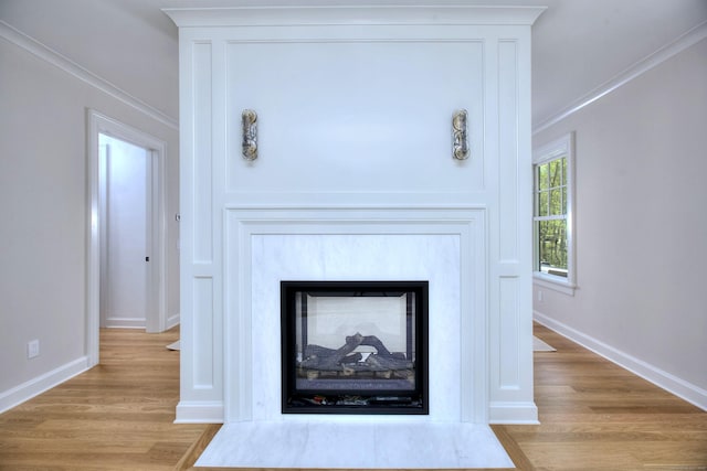 7 Brookside Dr, Westport, CT 06880 - interior details featuring a multi sided fireplace, baseboards, and wood finished floors