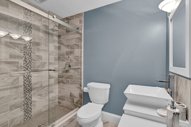 17 Hidden Oak Dr, Farmington, CT 06032 - bathroom with a stall shower, vanity, and a textured ceiling