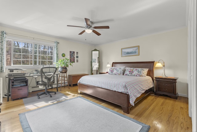 bedroom with a baseboard radiator, wood finished floors, crown molding, and a ceiling fan
