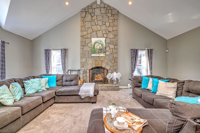 340 Webb Cir, Monroe, CT 06468 - carpeted living area featuring high vaulted ceiling, a stone fireplace, and baseboards