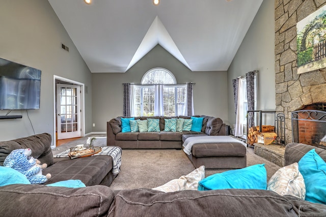 340 Webb Cir, Monroe, CT 06468 - carpeted living area featuring a fireplace, baseboards, visible vents, and a wealth of natural light