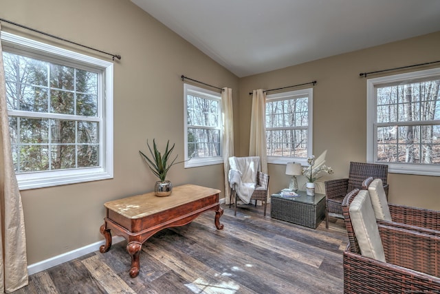 340 Webb Cir, Monroe, CT 06468 - living area featuring lofted ceiling, wood finished floors, and baseboards
