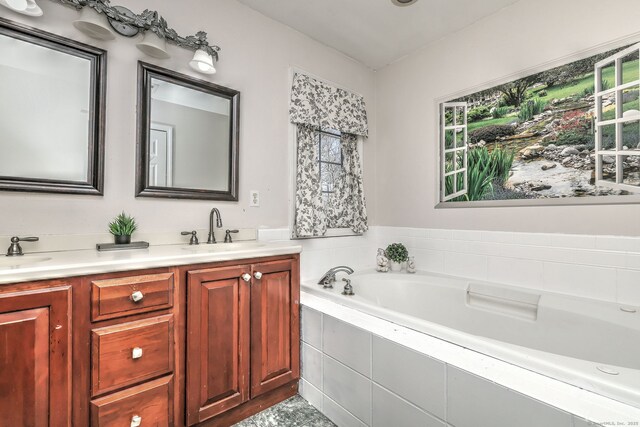 340 Webb Cir, Monroe, CT 06468 - full bath with double vanity, a bath, and a sink