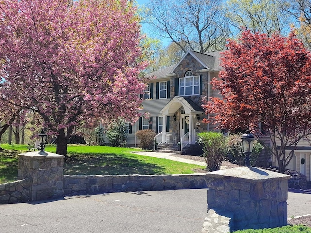340 Webb Cir, Monroe, CT 06468 - view of front of house featuring a front yard and stone siding