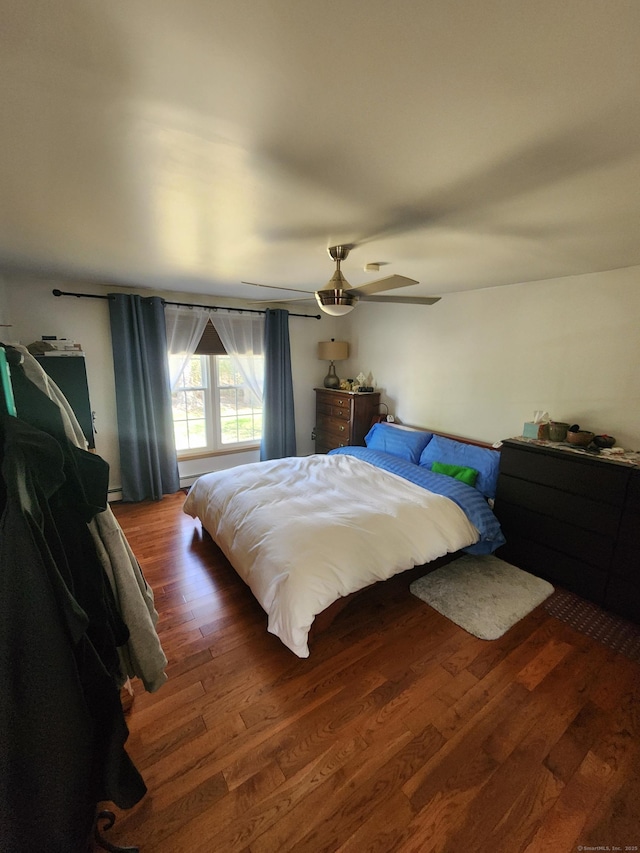 18 Outlook Rd, New Milford, CT 06776 - bedroom with ceiling fan, baseboard heating, and wood finished floors