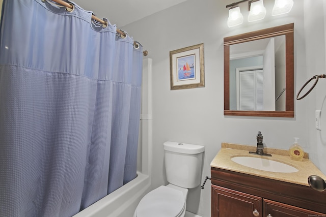 full bath featuring shower / tub combo, vanity, and toilet