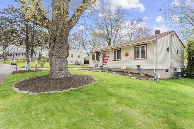 98 Cynthia Dr, West Haven, CT 06516 - view of front of house featuring central air condition unit, a chimney, and a front yard
