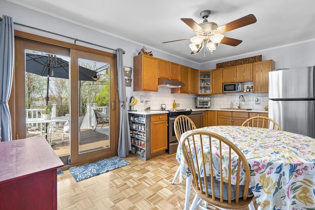 98 Cynthia Dr, West Haven, CT 06516 - kitchen featuring a sink, appliances with stainless steel finishes, ceiling fan, light countertops, and under cabinet range hood
