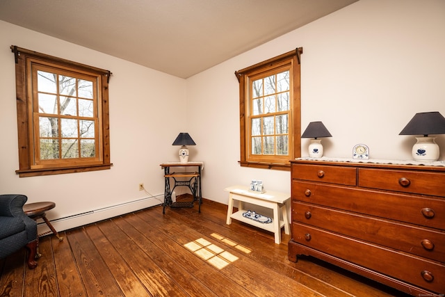 16 November Trl, Haddam, CT 06438 - living area featuring dark wood finished floors, baseboards, a baseboard heating unit, and plenty of natural light