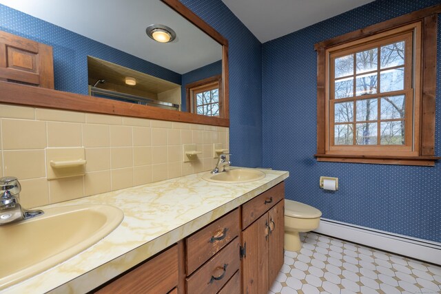 16 November Trl, Haddam, CT 06438 - full bath with a shower, toilet, a baseboard radiator, and a sink