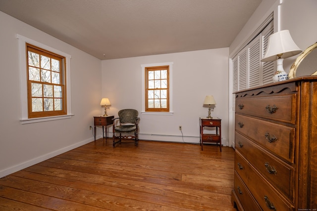16 November Trl, Haddam, CT 06438 - sitting room with a baseboard radiator, light wood finished floors, and baseboards