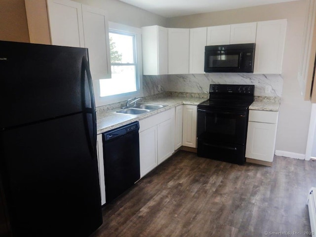 48 W Vine St, Stonington, CT 06379 - kitchen with a sink, white cabinetry, and black appliances