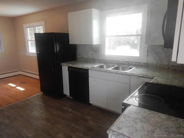 48 W Vine St, Stonington, CT 06379 - kitchen with dark wood finished floors, black appliances, white cabinetry, and a sink
