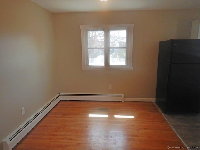 48 W Vine St, Stonington, CT 06379 - interior space with baseboards, light wood-type flooring, and baseboard heating