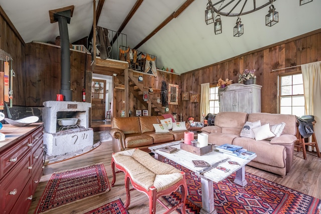 469 Platt Hill Rd, Winchester, CT 06098 - living room with wooden walls, wood finished floors, and plenty of natural light