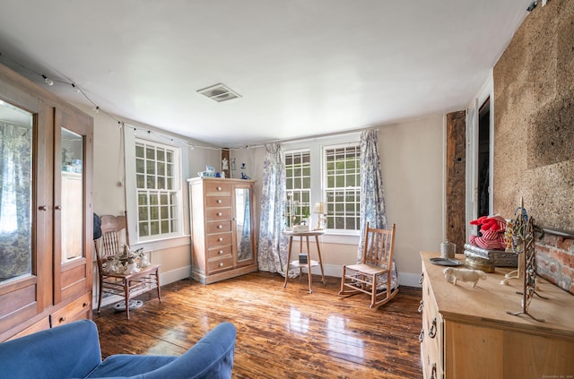 469 Platt Hill Rd, Winchester, CT 06098 - sitting room featuring rail lighting, baseboards, wood finished floors, and visible vents
