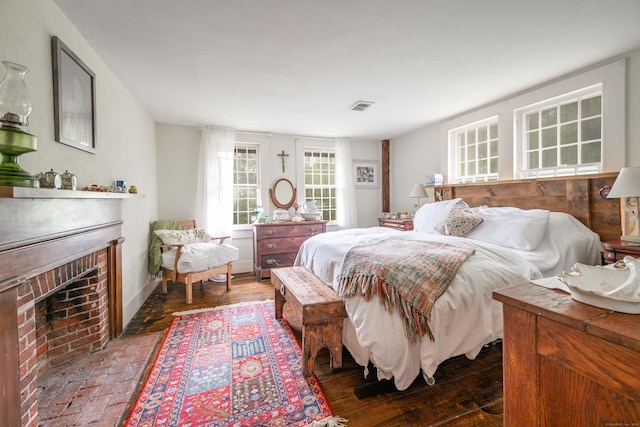469 Platt Hill Rd, Winchester, CT 06098 - bedroom featuring baseboards, a brick fireplace, and visible vents