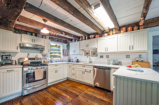 469 Platt Hill Rd, Winchester, CT 06098 - kitchen with a peninsula, beam ceiling, a sink, under cabinet range hood, and appliances with stainless steel finishes