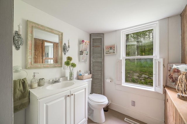 469 Platt Hill Rd, Winchester, CT 06098 - bathroom featuring baseboards, toilet, and vanity